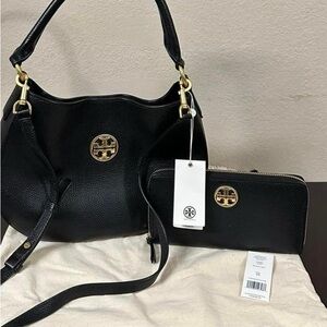 Tory bag with wallet together used two times looks brand new .